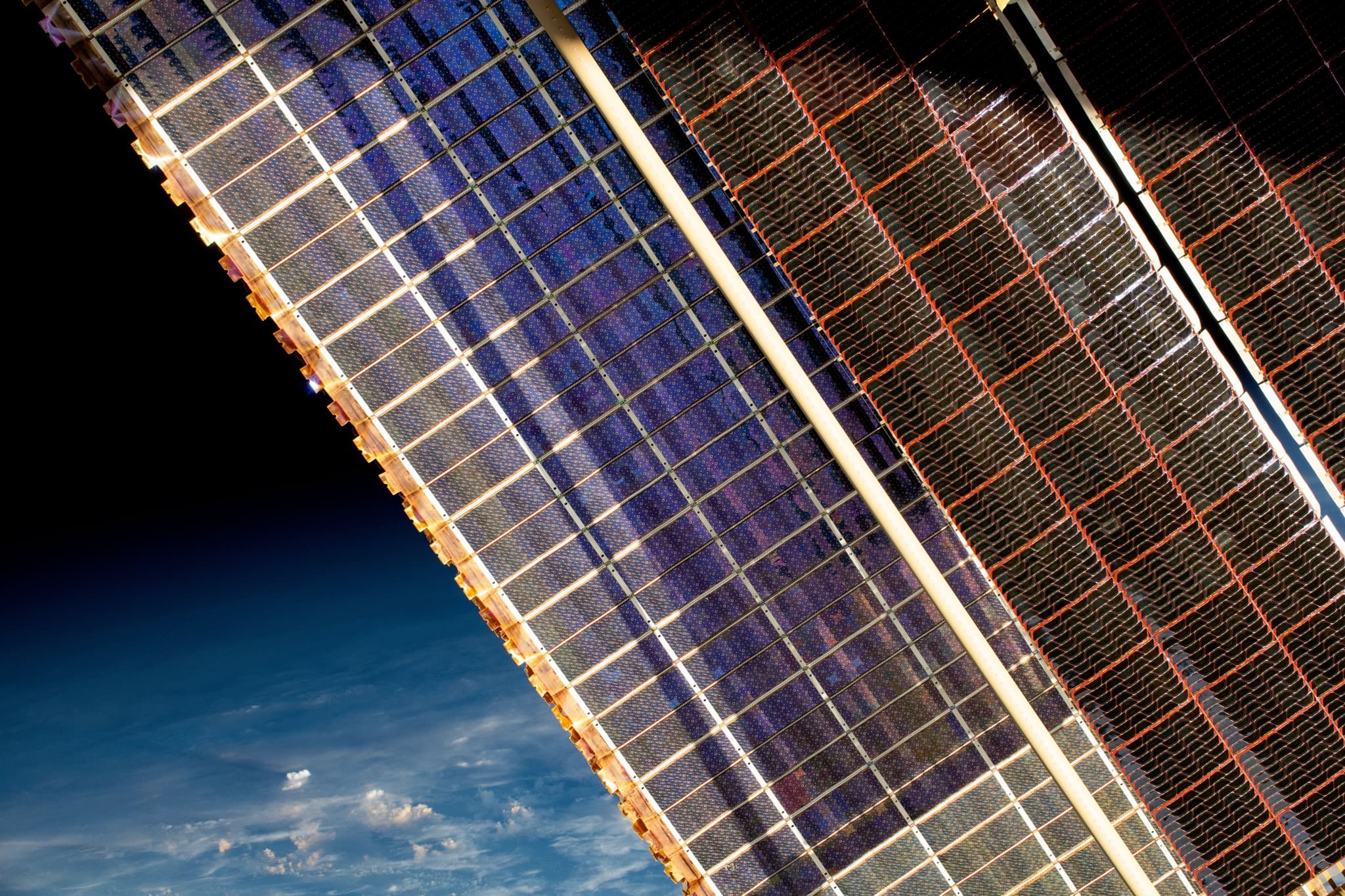 International Space Station solar arrays above Earth